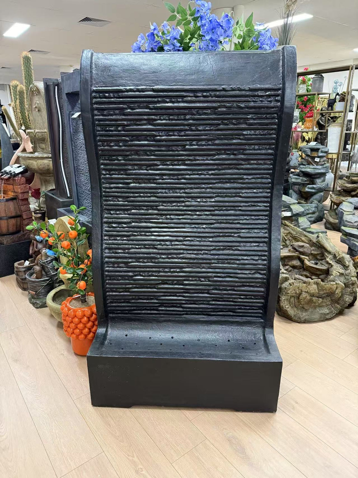 Ariana Stylish Tall Black Water Wall Made Cement Fibre