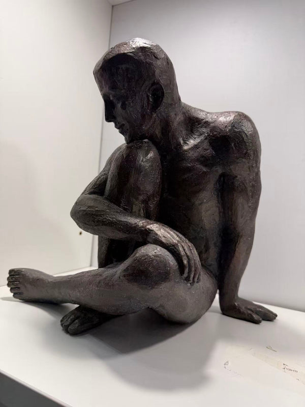 Guapo Sitting Man Copper Colour
