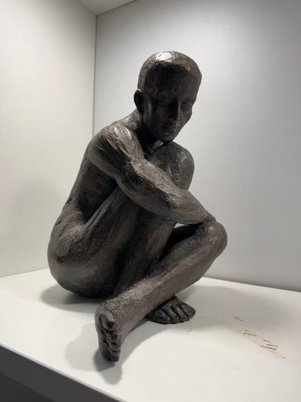 Guapo Sitting Man Copper Colour