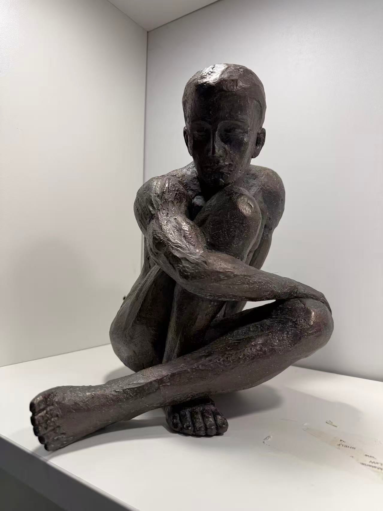 Guapo Sitting Man Copper Colour