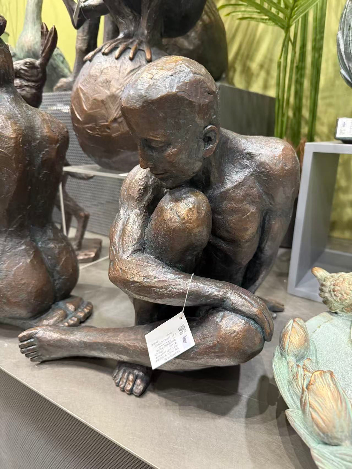Guapo Sitting Man Copper Colour