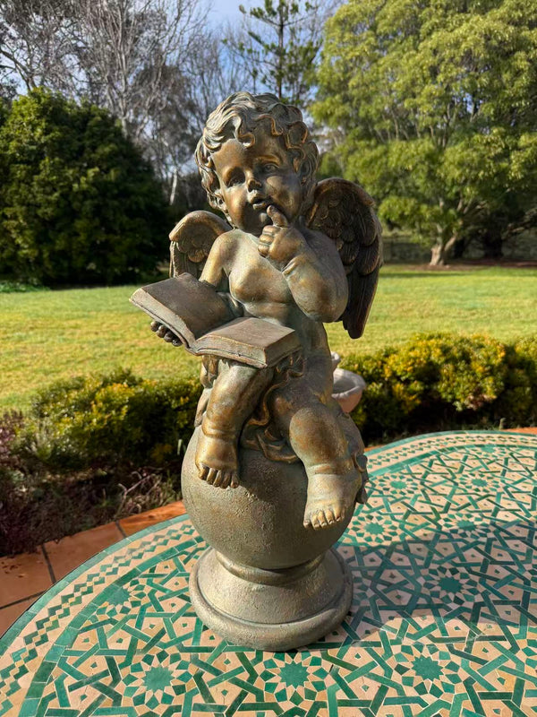 Sussurro Cherub Statue – Bronze, Gold & Blue MGO – Outdoor Garden Feature