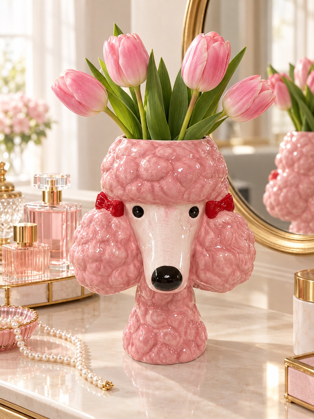 Benjita pink dolomite poodle vase with pink tulips on a vanity dresser