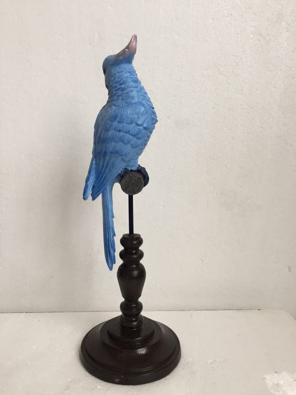 Exotic Light Blue Bird Parrot on Perch