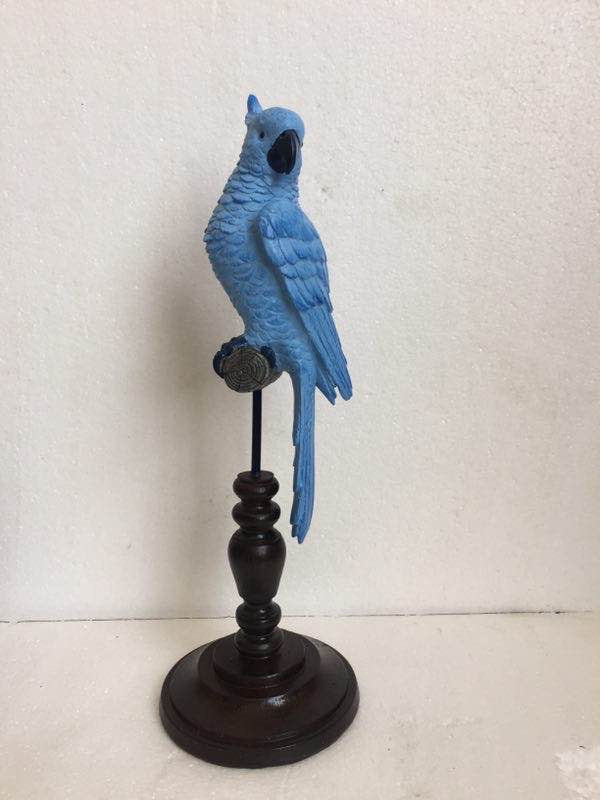 Exotic Light Blue Bird Parrot on Perch