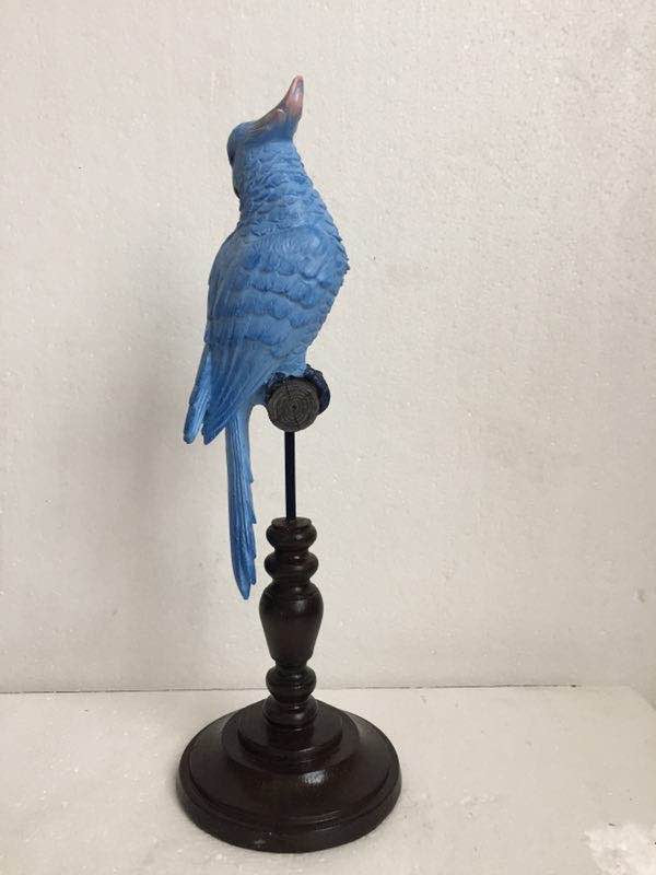 Exotic Light Blue Bird Parrot on Perch