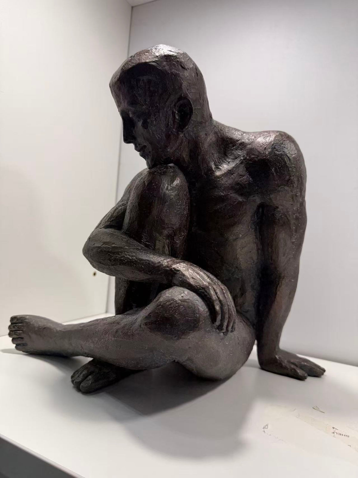 Guapo Sitting Man Copper Colour