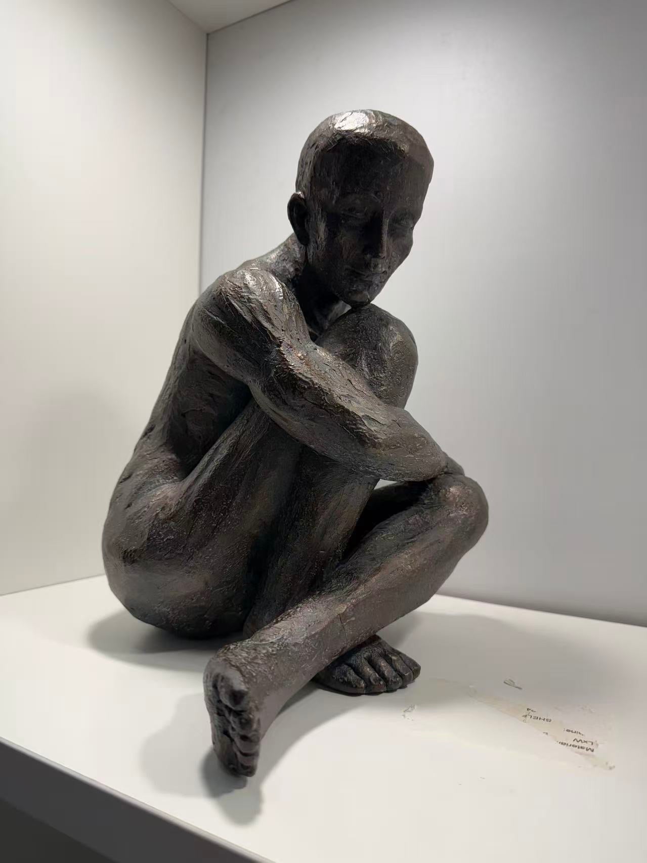 Guapo Sitting Man Copper Colour