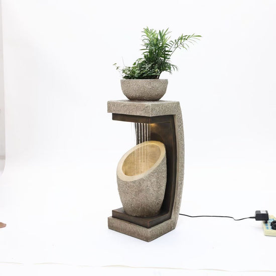 Liguria sandstone colour built-in planter atop ETA 18 April