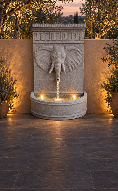 Annibale elephant head fountain lit at dusk