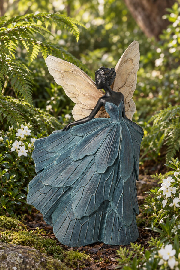 Teresa garden fairy with cream wings among ferns and white flowers