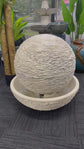 Caliante Outdoor Round Fountain with textured surface and round base Beige or Black Colour