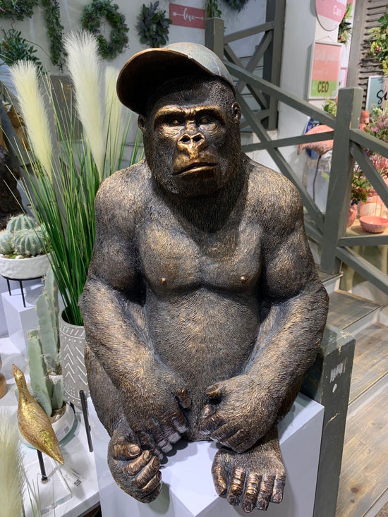Cool Sitting Gorilla with Baseball Hat